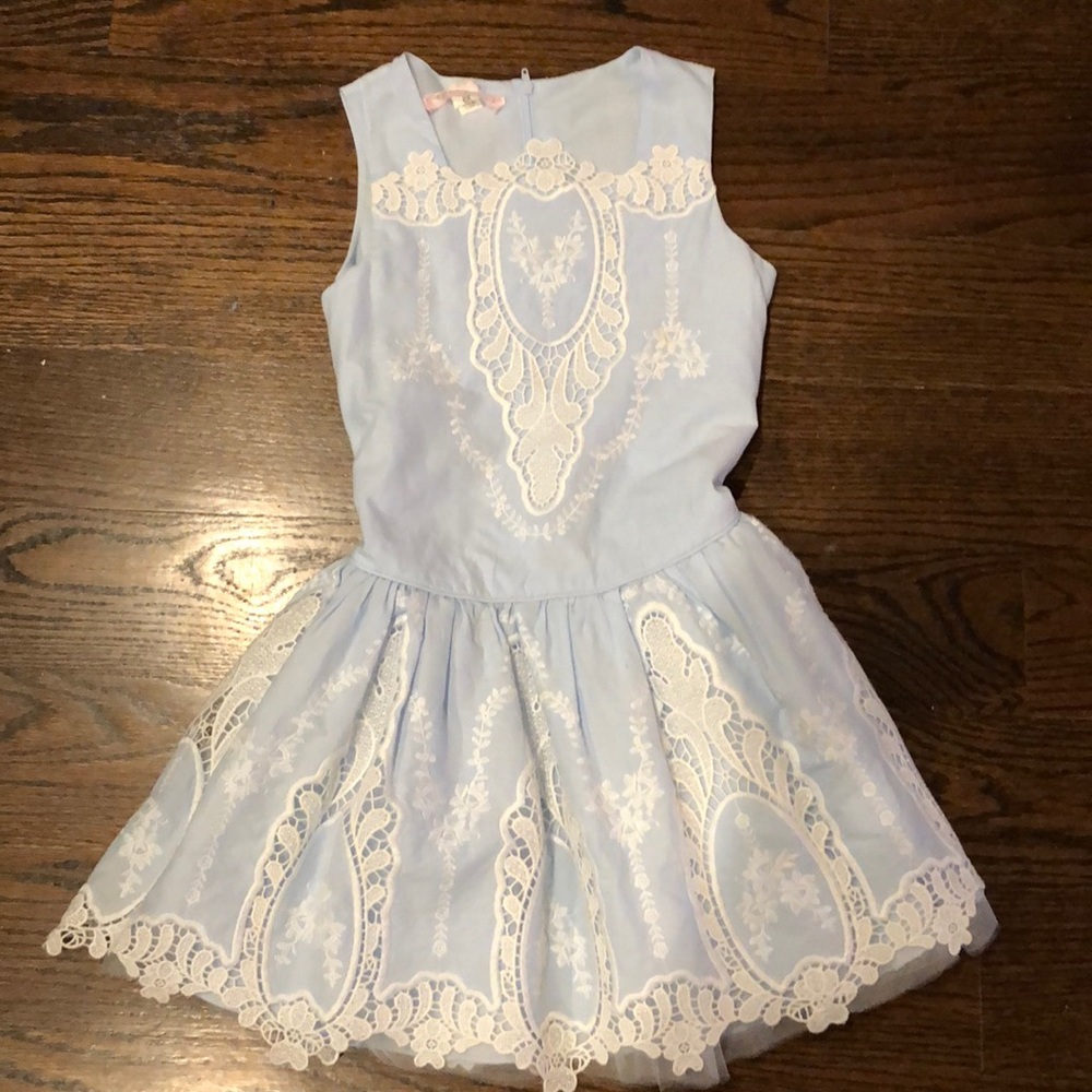 Girls dress with lace detail.